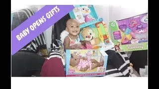 BABY OPENS 1ST BDAY PRESENTS!