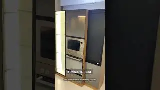 Kitchen tall unit with rolling shutter