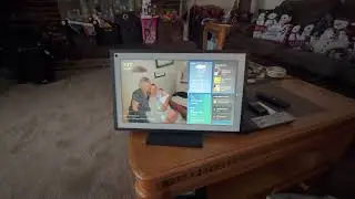 Echo show 15 play music and watch your photo frame at the same time