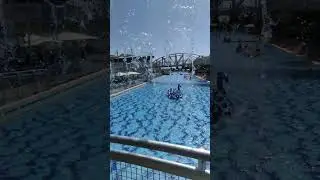 Slow motion from behind Holon waterfall