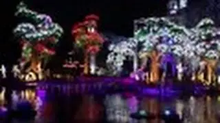 Dubai glow garden, Best Dubai Attractions, colorful lights and glowing park in Dubai - at Sunset