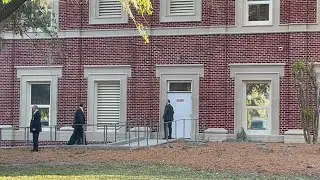 Men convicted of murdering Ahmaud Arbery walk into the courthouse to learn their fate