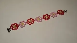 اعمال يدوية : اسوارة جميلة (زهور) من الخرز