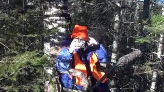 me and dorreen hunting in a tree