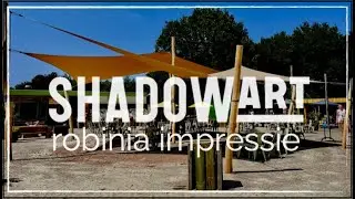 ShadowArt zonnezeil systeem | Impressie eindresultaat Robinia houten masten i.c.m. 375 m&sup2; zonnezeil