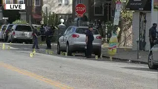 Drive-by shooting leaves 1 dead, 5 hurt; gunman still at large