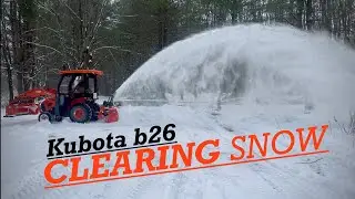 Kubota B26 snowblowing