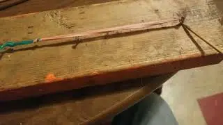Rubber band bird snare.