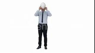 Young construction worker in hard hat on gray background | Stock Footage - Videohive