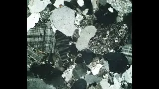 ESG 11 Sandstone thin-section S30 microscope video with crossed polars (XPL)