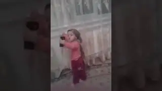 Funny baby taking selfie