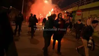 Italian police fire tear gas as protesters clash near Winter Olympics hockey venue