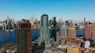 Aerial view of the East River waterfront in Long Island City with its modern glass and steel