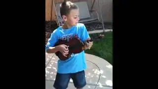 Austin playing his viola