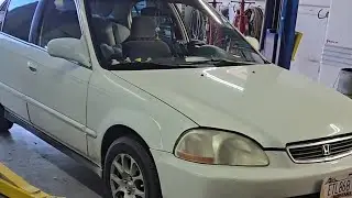 Free spinning control arm bolt and oil flooded spark plug repair on a 98 honda civic