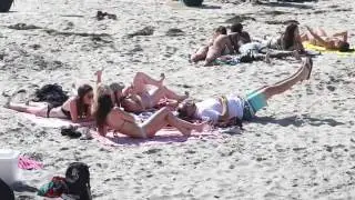 Sitting On People's Beach Towels. (Prank) !!