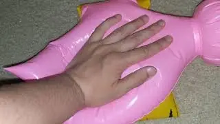 Deflating Inflatable Pink and Yellow Hammer