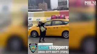 Thief smashes taxi window with cinder block