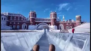 Gliding down the slide at Volga Manor ❄️