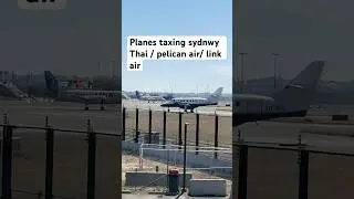Planes taxing sydnwy Thai air/ pelican air / link air