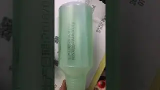 Handheld coding printer printing on PET bottles