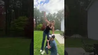 Practicing my old cheerleading moves with my Italian husband
