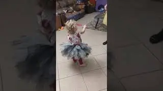 Hazel and Sissy twirling in tutus