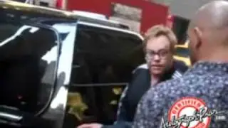 Elton John Signing Autographed Albums and Guitars for Autograph Pros Charity Works Program