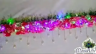 #toran #flowers #ledtoran #lights #doorhanging #flowertoran