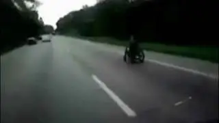 Guy in a Wheelchair Going at 60 mph on the Highway.