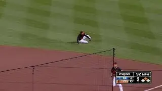 KC@BAL: Schoop slides and throws out Zobrist at first