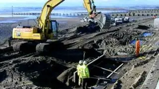 Pouring concrete on Tywyn Sea Defence Scheme.