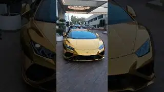 Gold wrapped Lamborghini Huracan parked in Beverly Hills at Neiman Marcus
