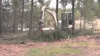 TerexTC75 and Fecon CEM Grinding head
