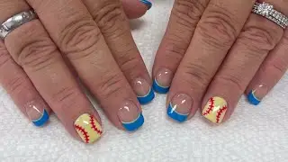 Super cute yellow and blue nail art for football team