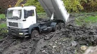 MAN TGA 6x6 dump truck in rough terrain
