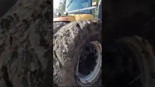 Laying drainage tile with a big cat challenger #shorts #familyfarm