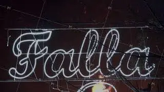 Banner with the word Falla on the street at night