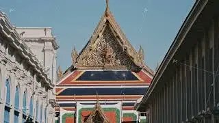 Ornate golden roof detail of temple at the Grand Palace in Bangkok. Sunny day reveals beautiful