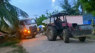 Hyundai truck stuck in mud rescuing by Belarus MTZ 82