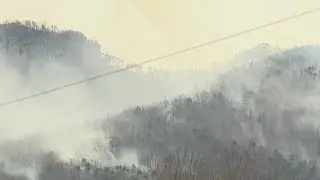 Crews continue to battle fire on Pilot Mountain