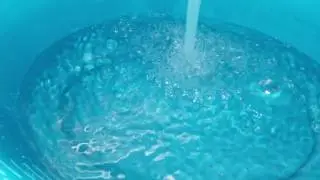 Filling bucket with water