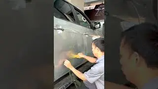 How to fix a dented car by pulling it with tape.#shorts