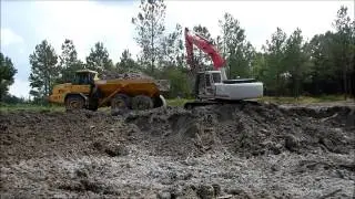 Excavator loading out dirt