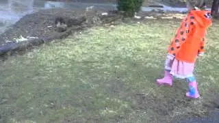Brenna tromps in the puddles
