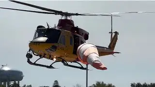 SEARCH AND RESCUE HELICOPTER TAKING OFF FROM PRHC