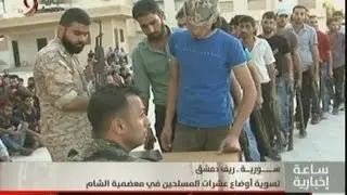 تسوية أوضاع عشرات المسلحين في معضمية الشام - موفدة الإخبارية ميشلين عازر