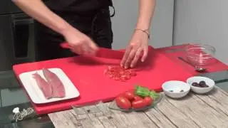 Palamita con pomodorini olive e capperi