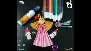 Christmas Angle making with the help of Origami paper.