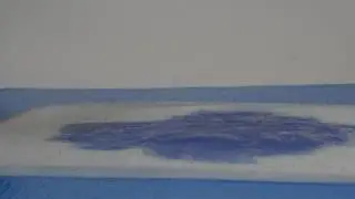 T Mat absorbent mat: demo of rapid fluid absorption